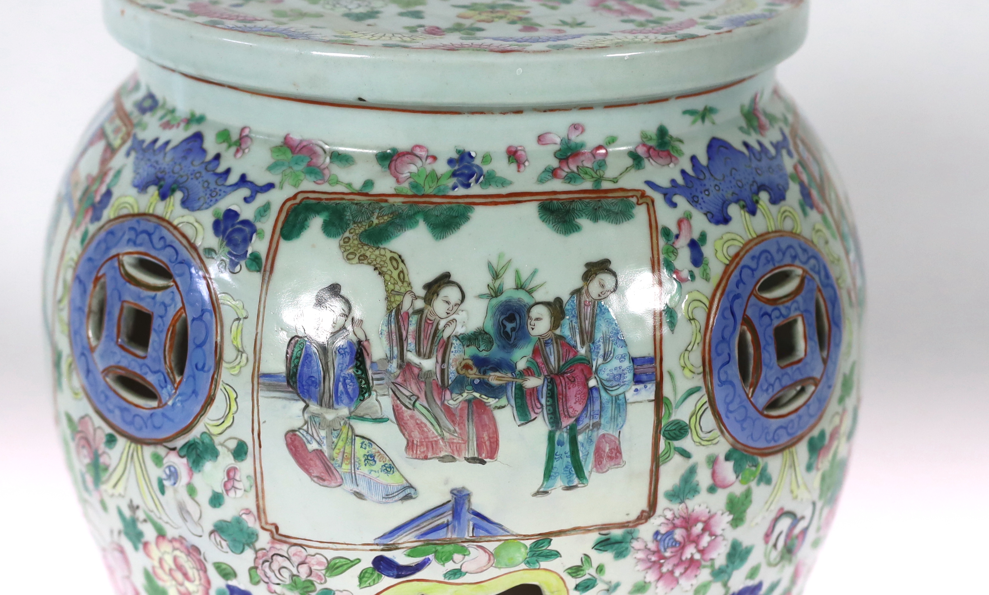 A Chinese Canton decorated famille rose garden seat, 19th century, broken and restored